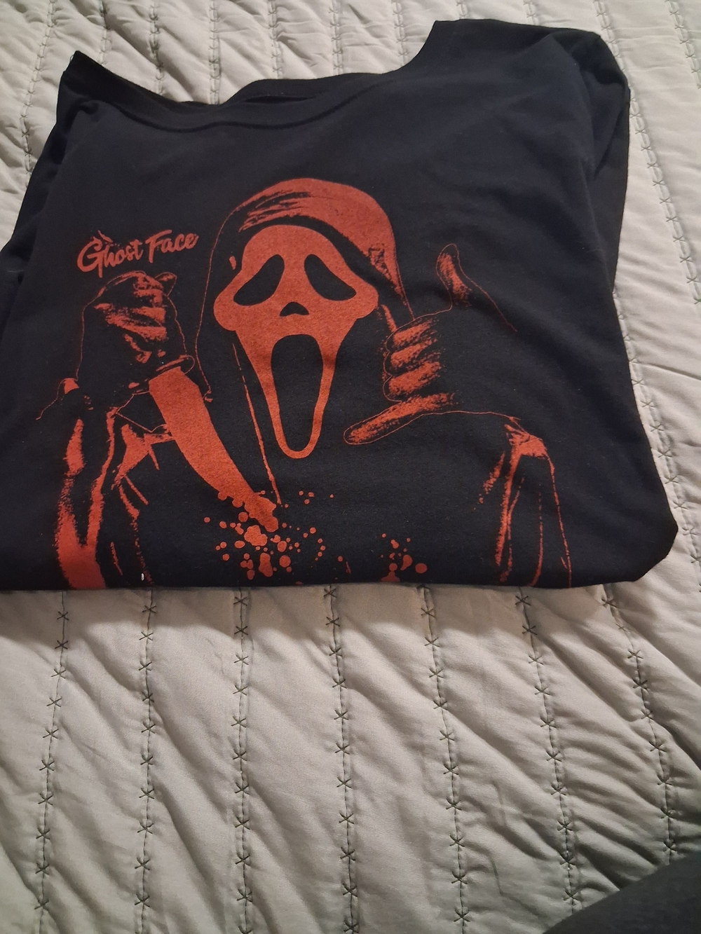 WonensBlack T-Shirt with Orange Ghost Face Graphic
